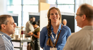 meet and greet doctors chatting at meet and greet event