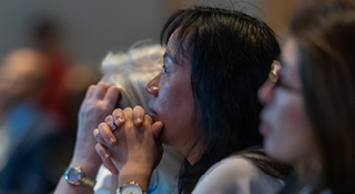 think tank Attendees listening intently to a speaker