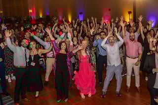 RA24 Saturday Celebration .01 Group of people celebrating at the Saturday Celebration, Regional Anesthesiology and Acute Pain Medicine Meeting